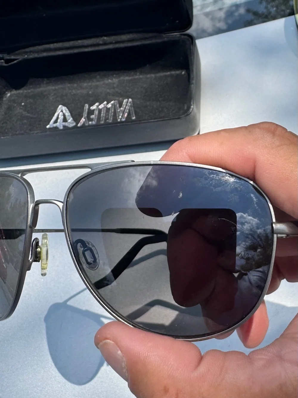 Revo Men’s Aviator Sunglasses in Silver Frame with Dark Blue Lenses